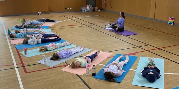 Kids doing yoga at Stretch Kids Yoga school incursion programs