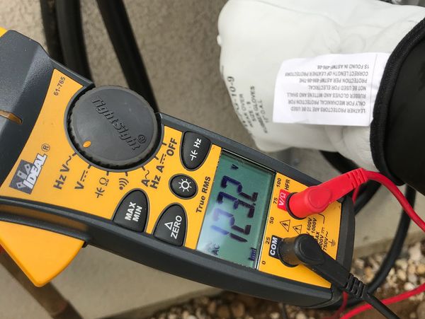 Electrical meter being used for troubleshooting a service call