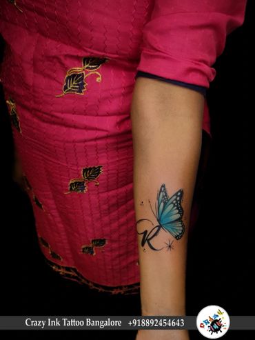 Butterfly With Letter Tattoo Design