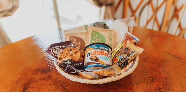 Snacks on custom-made copper-top dining table in Sage Yurt