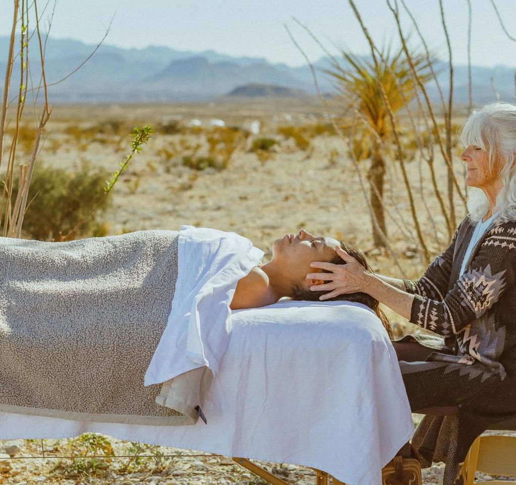 Massage in progress with Chisos Mountains backdrop