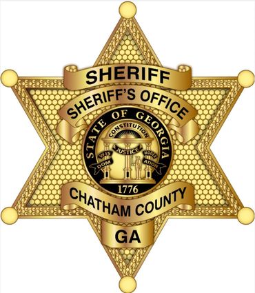 Gold sheriff badge for Chatham County, Georgia with state emblem.