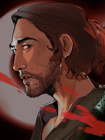 Artistic side profile of a man with long hair and a beard.