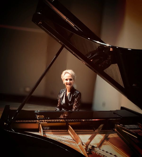 Vivian at the piano
