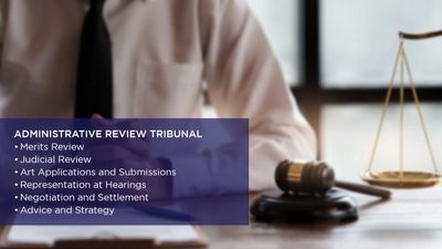 Legal professional with gavel and scales, highlighting tribunal services.
