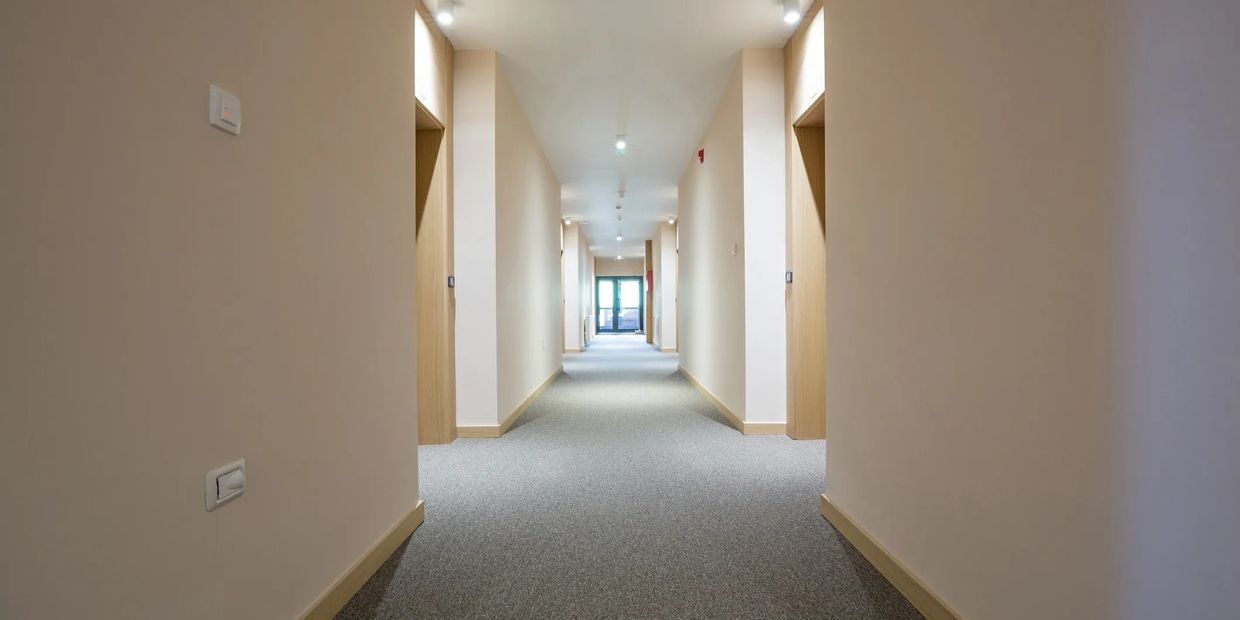 Hotel hallway carpet installed by El Nino Floors