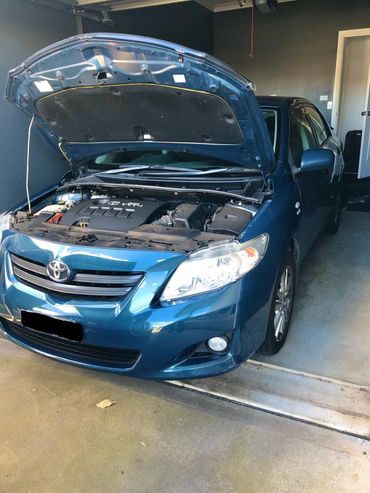 Toyota Corolla major logbook service completed with brake fluid flush, fuel filter replacement, air 