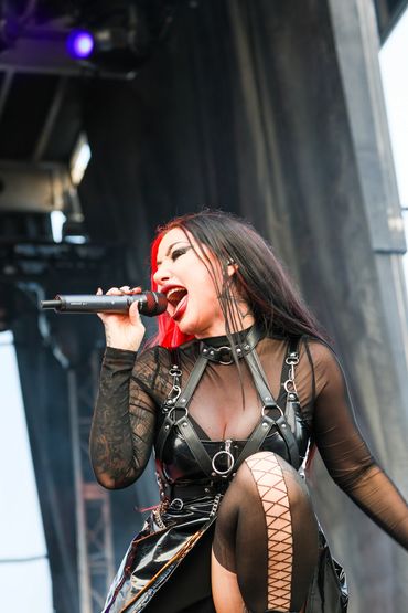 Ash Costello is famous as the lead vocalist of the rock band New Year's Day. 