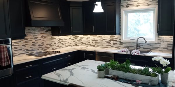 A glass kitchen backsplash