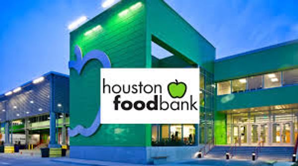 Houston Food Bank building at dusk.