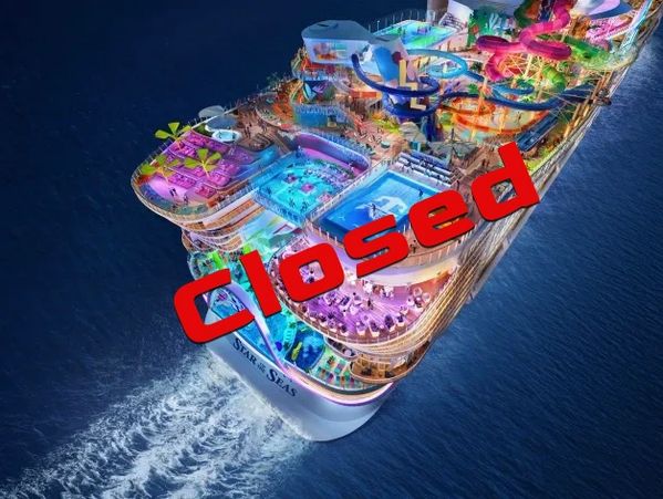 A vibrant cruise ship with water slides and pools, marked as closed.