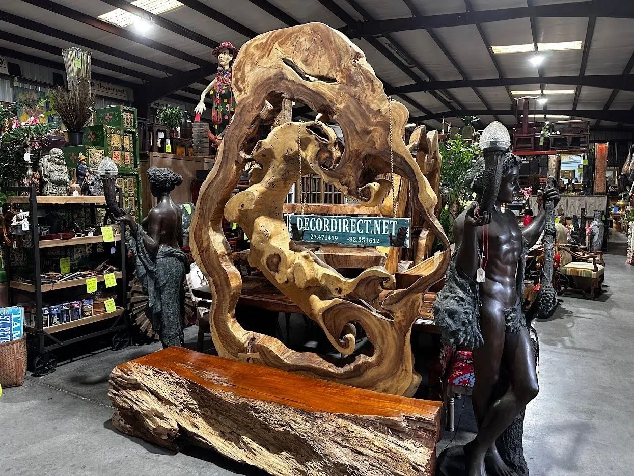 Wood art 10 foot round live edge slab on iron base, teak bench & life size bronze figural lamps