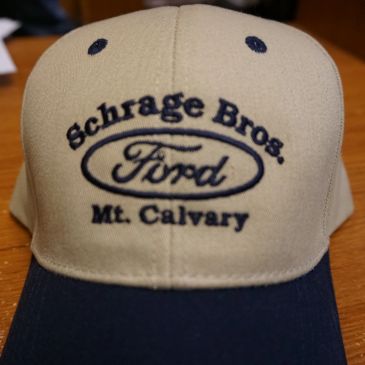 Beige and navy Ford cap from Schrage Bros.