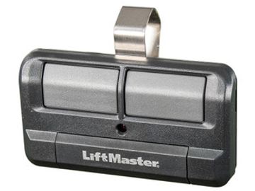 A black LiftMaster garage door remote with two buttons and a metal clip.