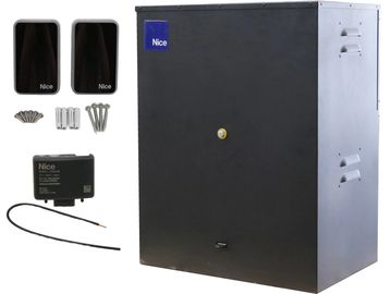 A black automatic gate opener kit with sensors and screws.