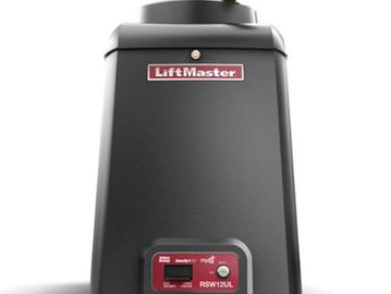 A black LiftMaster garage door opener with a red control panel.
