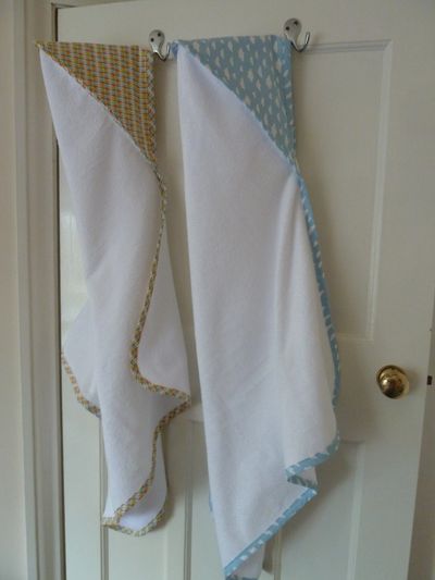 Hooded towels made in cotton, bamboo and polyester mix towelling.