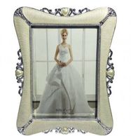 This beautiful photo frame will add a touch of glamour to your dressing table. Best Gift Item.