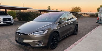 Satin black wheel powder coat on Tesla Model X.