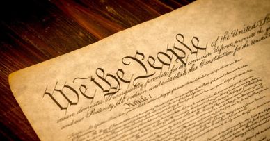 Close-up of the U.S. Constitution's preamble beginning with 'We the People'.