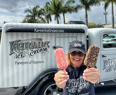 Debbie from Karmic Ice Cream holding up two ice cream treats