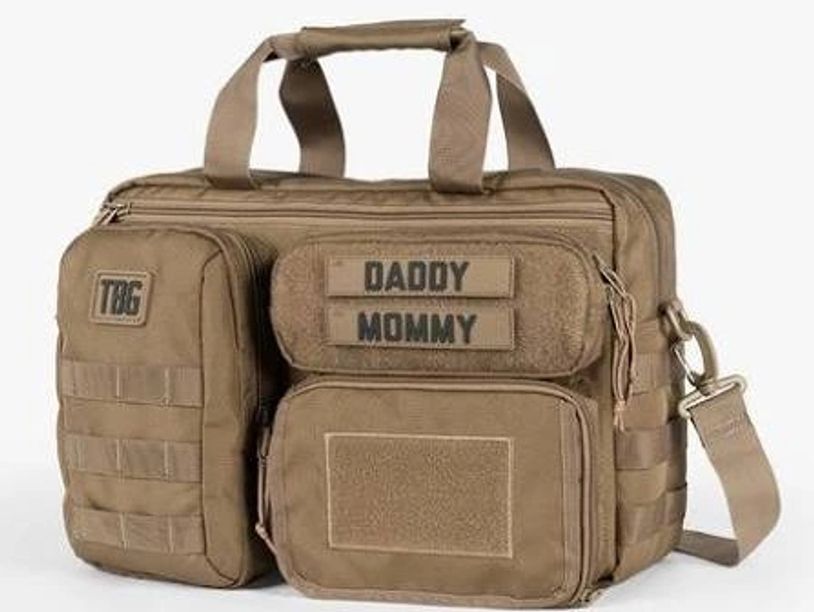 Tactical brown bag with multiple compartments and patches labeled Daddy and Mommy.