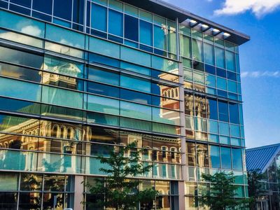 Reflection of the court house in the Commons glass. Photo credits: Don Nissan