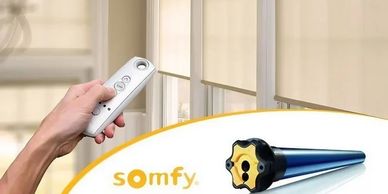 Remote-controlled window blinds with Somfy motorized system.