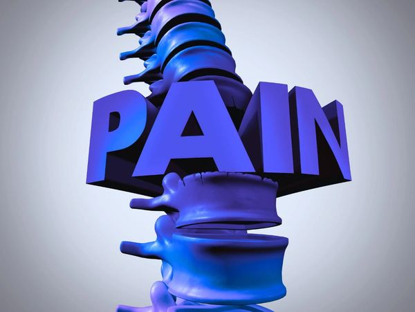 3D illustration of a spine with the word PAIN embedded in it.