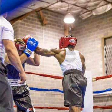 Two players boxing in a boxing ring