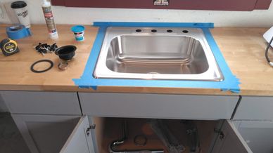 Cutting in a new stainless sink into a butcher block countertop. Measure 5 times, cut carefully!