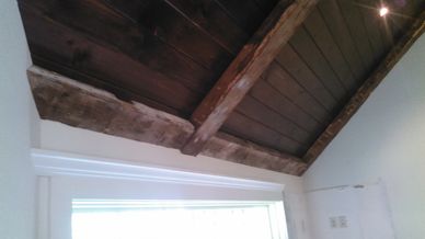 I salvaged an old barn to claim, recut, and install these beautiful old hand hewn beams.   