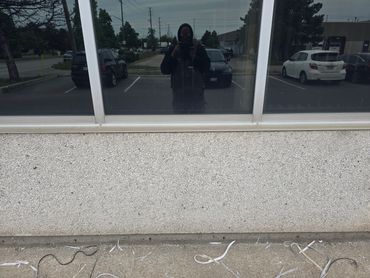 Commercial window caulking and removal.
