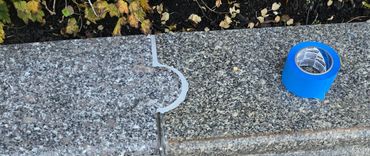 Caulking granite to granite joints.