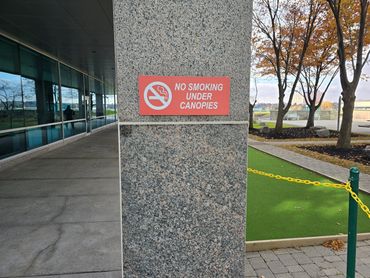 Caulking granite columns.