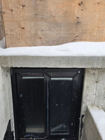 Basement window caulking.