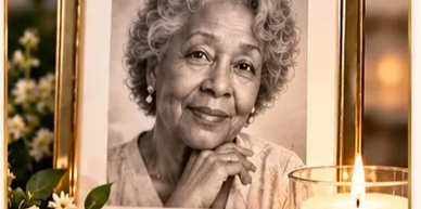 Memorial photo of an elderly woman with a candle.