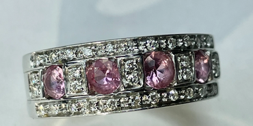 Heavy 18ct White Gold, Diamond and Pink Sapphire ring.