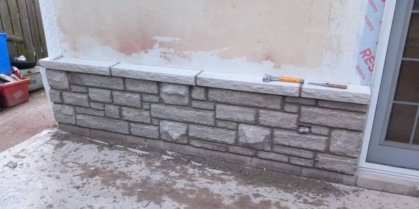 Beautiful stone wall with a stone sill in windsor Ontario 