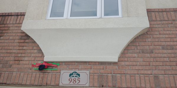 Exterior stucco repair on ranch style home in south windsor