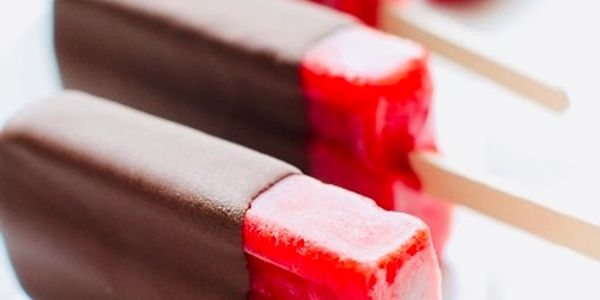 Chocolate-covered red popsicles.
