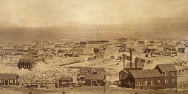 A sepia-toned image of a historic town.