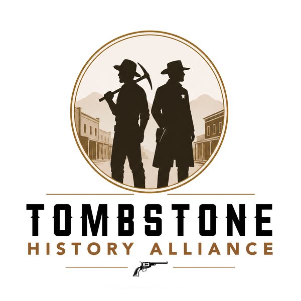 Logo featuring two Old West figures with text.