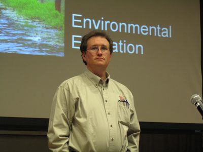 Stephen M. Vantassel speaking before an audience on vertebrate pest management and wildlife control.