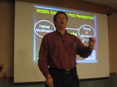 Stephen M. Vantassel teaching an audience on controlling wildlife and other vertebrate pests.