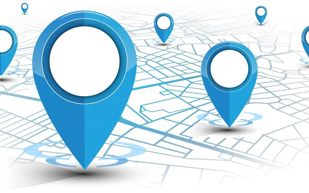 Blue location markers on a digital map background.