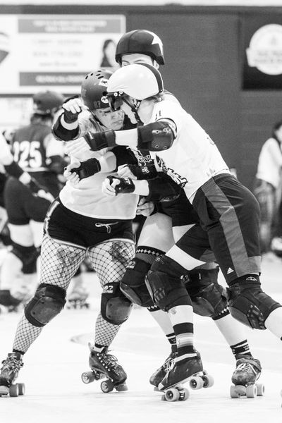 Skaters Moose and Daddi Hood block a jammer