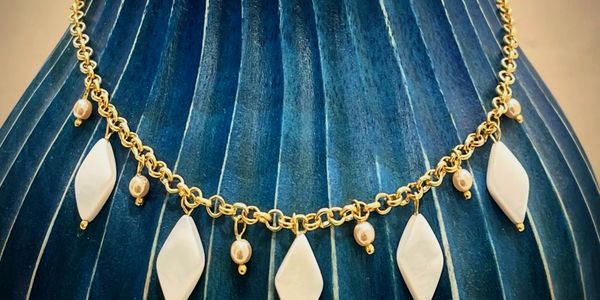 Rhombus pearls charms