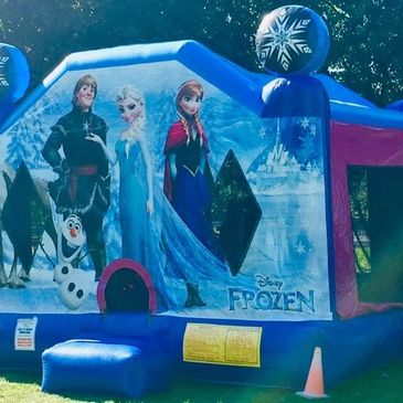 Frozen-themed inflatable bounce house featuring main characters and snowy backdrop.