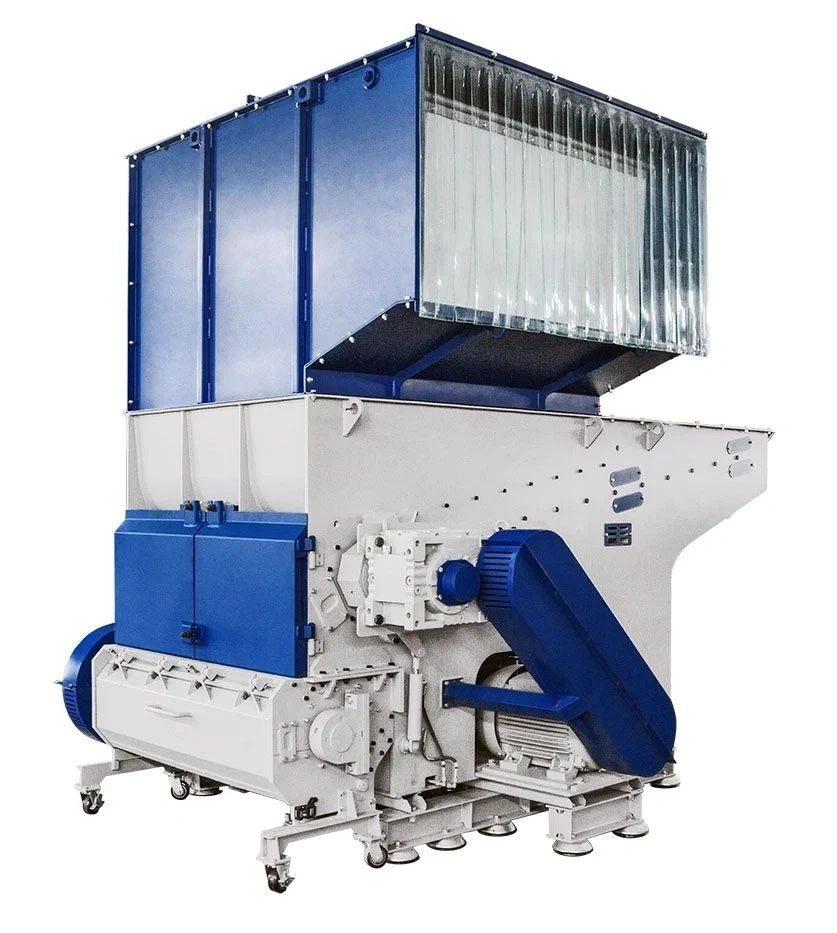 Industrial shredder machine with blue and white components.